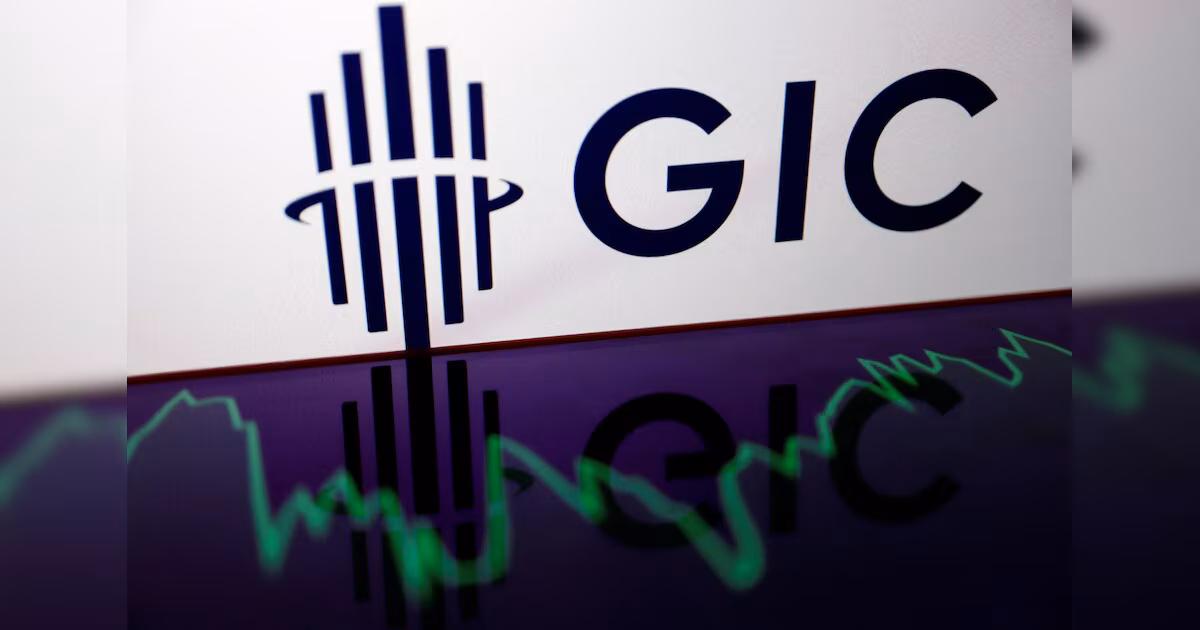 GIC logo displayed on a white wall with a digital stock market graph reflected below, symbolizing the investment strategy and financial performance of Singapore’s sovereign wealth fund.