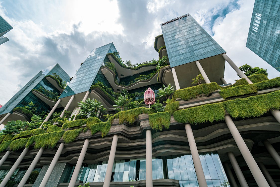 Park Royal Hotel Singapore modern exterior with lush greenery and vibrant architectural design.